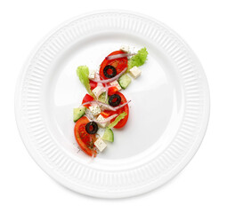 Plate with tasty Greek salad on white background