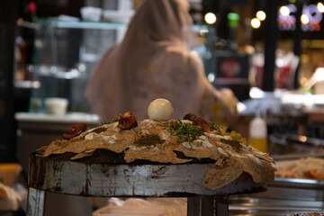 Druze woman prepare Taboon bread in Haifa Israel