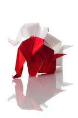 Origami elephants isolated on white background