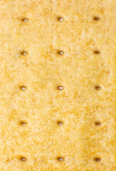 Roasted cookies texture background. Loaf Bakery concept. Close up, macro photo. Beautiful natural wallpaper.