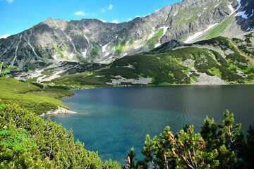 Fototapeta na wymiar The beautiful lake Wielki Staw in the High Tatras, Poland.