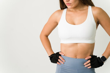 Strong abdomen of a sporty fitness woman