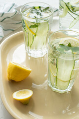 Summer fresh lemonades with cucumber, lemon and mint.