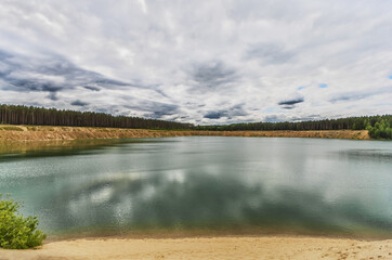 Obraz premium Water quarry on summer day