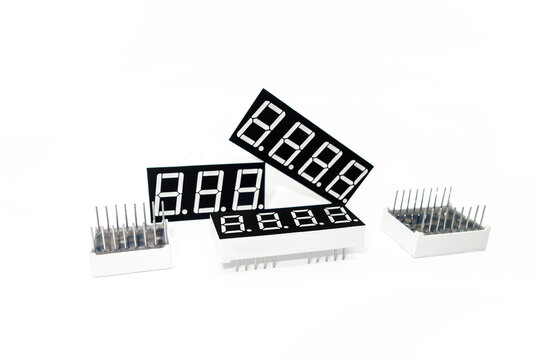 Set of LED digital indicators arranged in conceptual way on white background