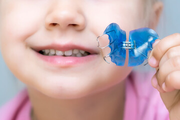 Dental plate. Expansion of the jaw in a child. A plate to heaven. There is not enough room for the...