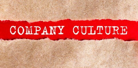 COMPANY CULTURE appearing behind torn paper.Business concept