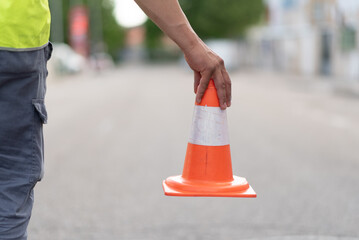 young technician at work marking work area