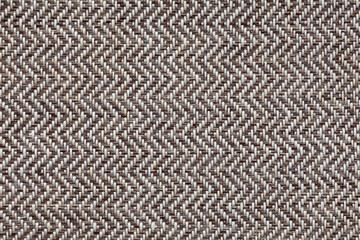 Background image - textured natural rough fabric of gray tones with a herringbone pattern