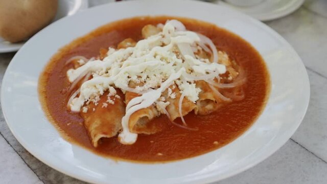 Entomatadas - traditional Oaxaca dishes. Mexican food