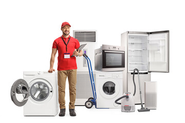 Full length portrait of a shop assitant with many home appliances