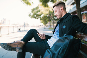 Man using his mobile phone.