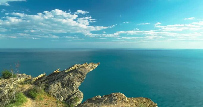 Crimean Trolltunga is a rock ledge above the Black Sea. Landscape and nature of the Crimean peninsula
