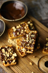French waffles with chocolate and nuts.