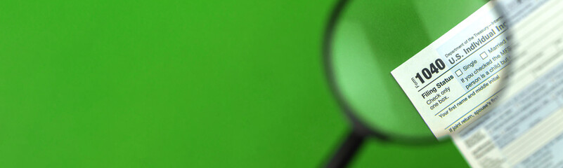 Concept of taxes by individuals and corporations, income tax and property tax banner with copy space, green office desk background