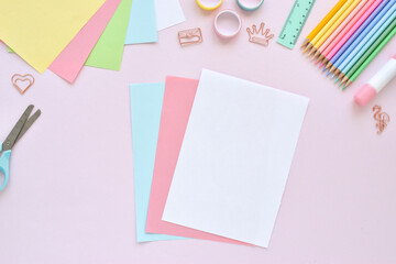 DIY. Paper ice cream with kids at home. Step-by-step instructions. Top view. Step 1. Prepare sheets of colored paper. Popsicle