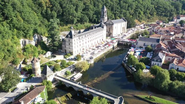 Flight over the city Brantome en Perigord on summer day. France