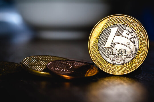 In this photo illustration one real coin. Money from Brazil. Economy, investment and income concept.