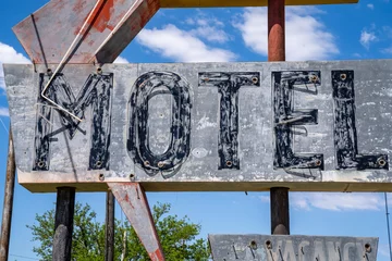 Fotobehang Generic, old abandoned neon sign for a motel along Route 66 in Oklahoma © MelissaMN