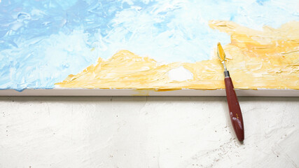 Ocean acrylic painting with palette knife on canvas with blue and turquoise. Golden sand on beach with trowel texture technic. Water splash art hand paint.  Summer and seascape feeling and tone.