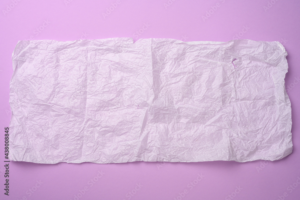Poster rectangular crumpled sheet of paper in tissue on a purple background