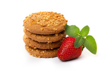 Oatmeal cookies with strawberry and green mint leaf on a white background. Diet food.