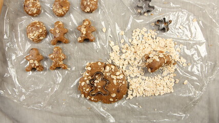 Ginger bread cookies homemade cooking for Christmas traditional dessert. Kids and family love to prepare to make dough and bake them. Then paint them with sugar paste to decor in many colors.