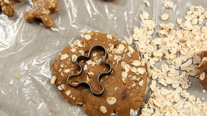 Ginger bread cookies homemade cooking for Christmas traditional dessert. Kids and family love to prepare to make dough and bake them. Then paint them with sugar paste to decor in many colors.