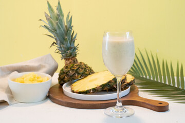 Pinacolada drinks with pineapple on the table