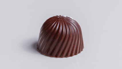 Close-up dark chocolate on light gray background