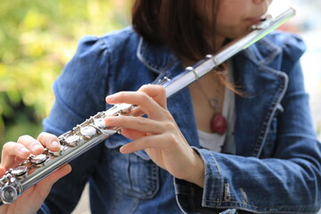 Flute classical instrument player playing song. Instructor practicing bronze woodwind for orchestra...