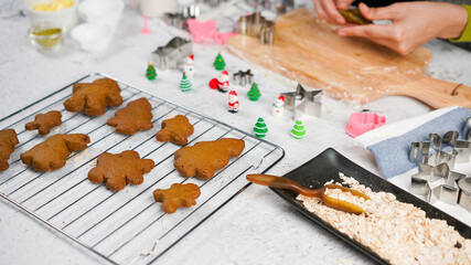 Ginger bread cookies homemade cooking for Christmas traditional dessert. Kids and family love to prepare to make dough and bake them. Then paint them with sugar paste to decor in many colors.
