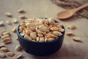 Roasted peeled peanuts in bowl.