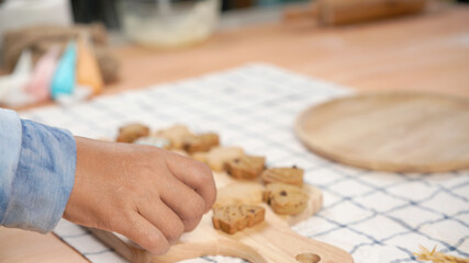 Ginger bread cookies homemade cooking for Christmas traditional dessert. Kids and family love to prepare to make dough and bake them. Then paint them with sugar paste to decor in many colors.