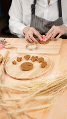 Ginger bread cookies homemade cooking for Christmas traditional dessert. Kids and family love to prepare to make dough and bake them. Then paint them with sugar paste to decor in many colors.