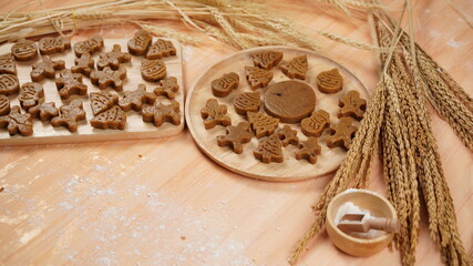 Ginger bread cookies homemade cooking for Christmas traditional dessert. Kids and family love to prepare to make dough and bake them. Then paint them with sugar paste to decor in many colors.