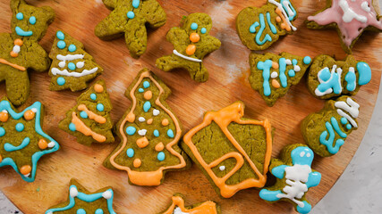 Green ginger bread cookies homemade cooking for Christmas traditional dessert. Kids and family love to prepare to make dough and bake them. Green tea cookies