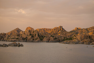a storm approaching on a calm river 