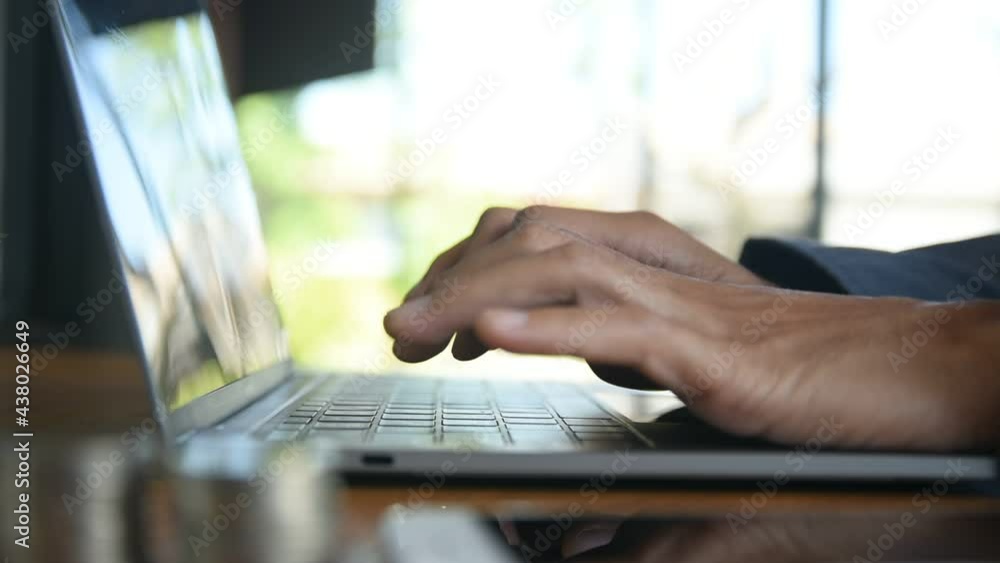 Poster close up hand typing computer laptop typing working in cafe.