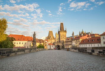 Naklejka na ściany i meble View of Prague, Charles bridge, Vltava river, St. Vitus cathedral on a sunny day