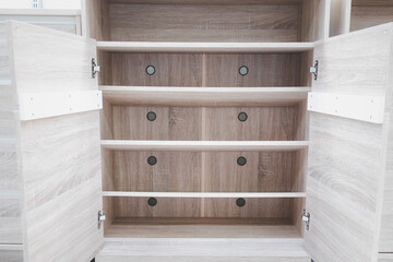 Open door of wood shelves