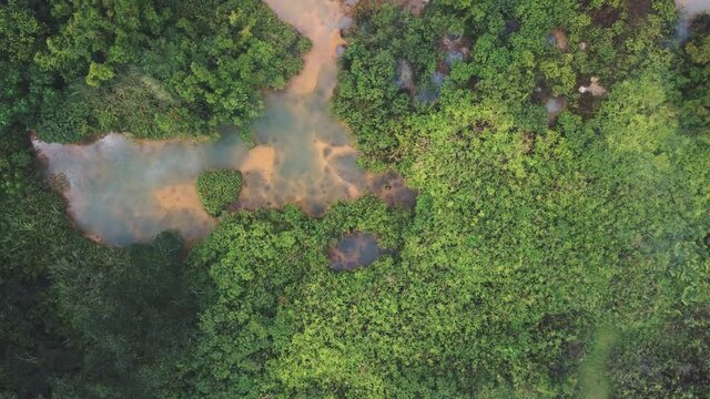 Nag Aso - Boiling Lake, Manito Albay, Philippines. Aerial high angle view of the lake and jungle trees