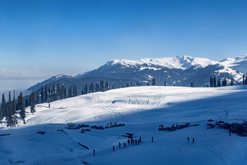 Fototapeta na wymiar Winter season, Gulmarg is a town, a hill station, a popular tourist & skiing destination, Kashmir, India