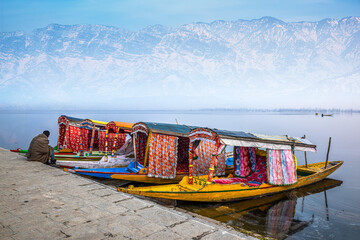 Beautiful view of the colorful Shikara boats floating on Dal Lake, Srinagar, Kashmir, India. - Powered by Adobe