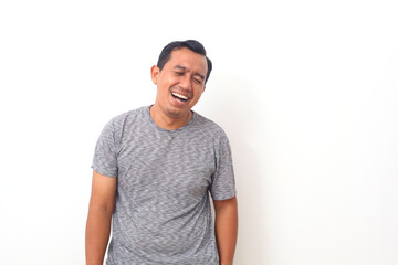 Portrait of Asian man with laugh face. Isolated on white background.