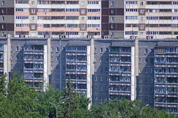 Fototapeta na wymiar Multi-storey residential buildings on a sunny summer day