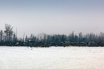 Naklejka premium Snow-filled farm villages and rivers on the way from Srinagar to Sonmarg and Gulmarg