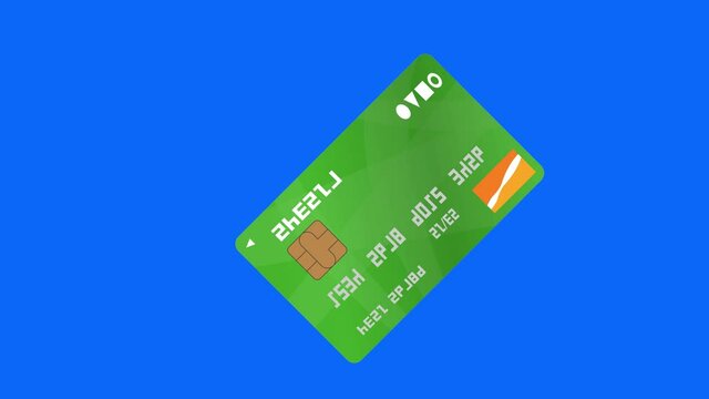 回転するクレジットカード　グリーン　ブルーバック　ループ　4K