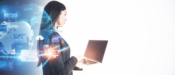 Side view of young businesswoman with laptop and abstract digital hologram isolated on white mockup background. Technology and digital transformation concept. Double exposure.