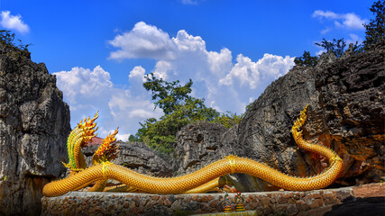 Twin Stucco painted as a large serpent on the mountains at Wat Phu Taphao Thong temple Udon thani province Thailand. Most famous temple.